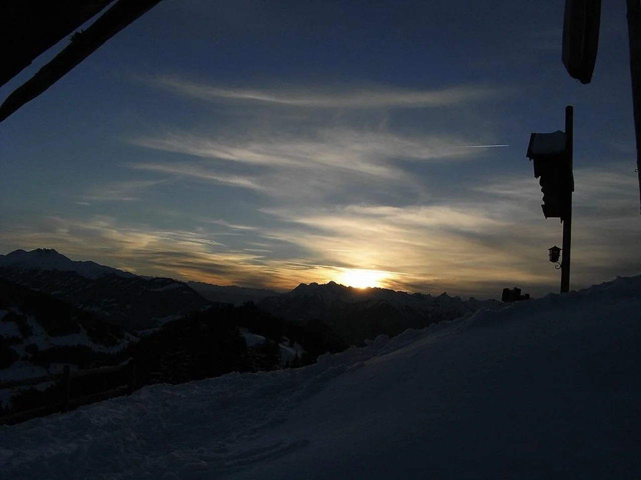 Appartement Rossalm - Sonnenaufgang durch Wolken